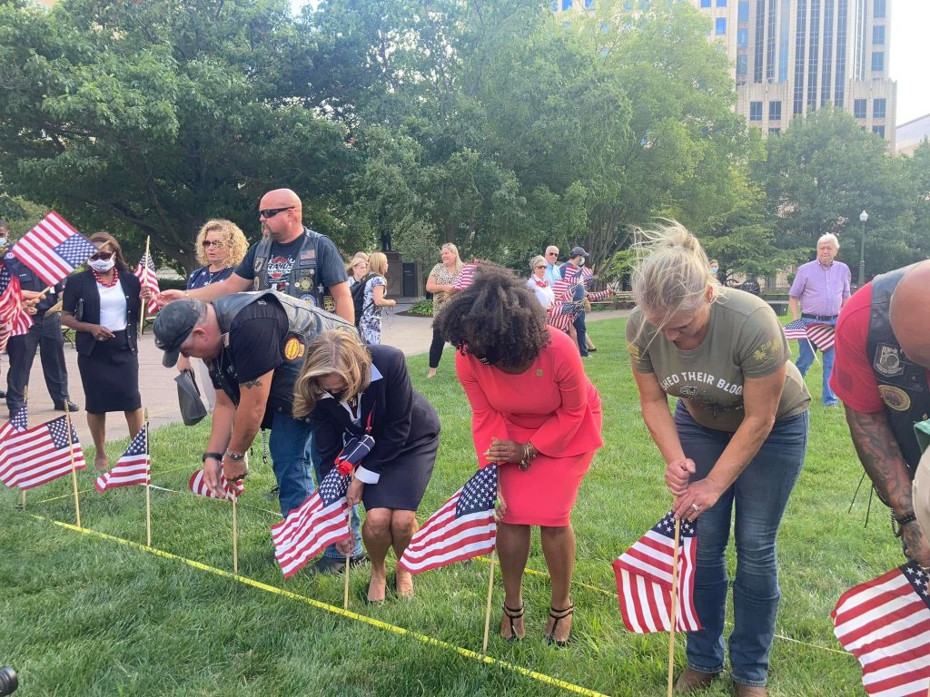 Flag planting ceremony honoring fallen heroes