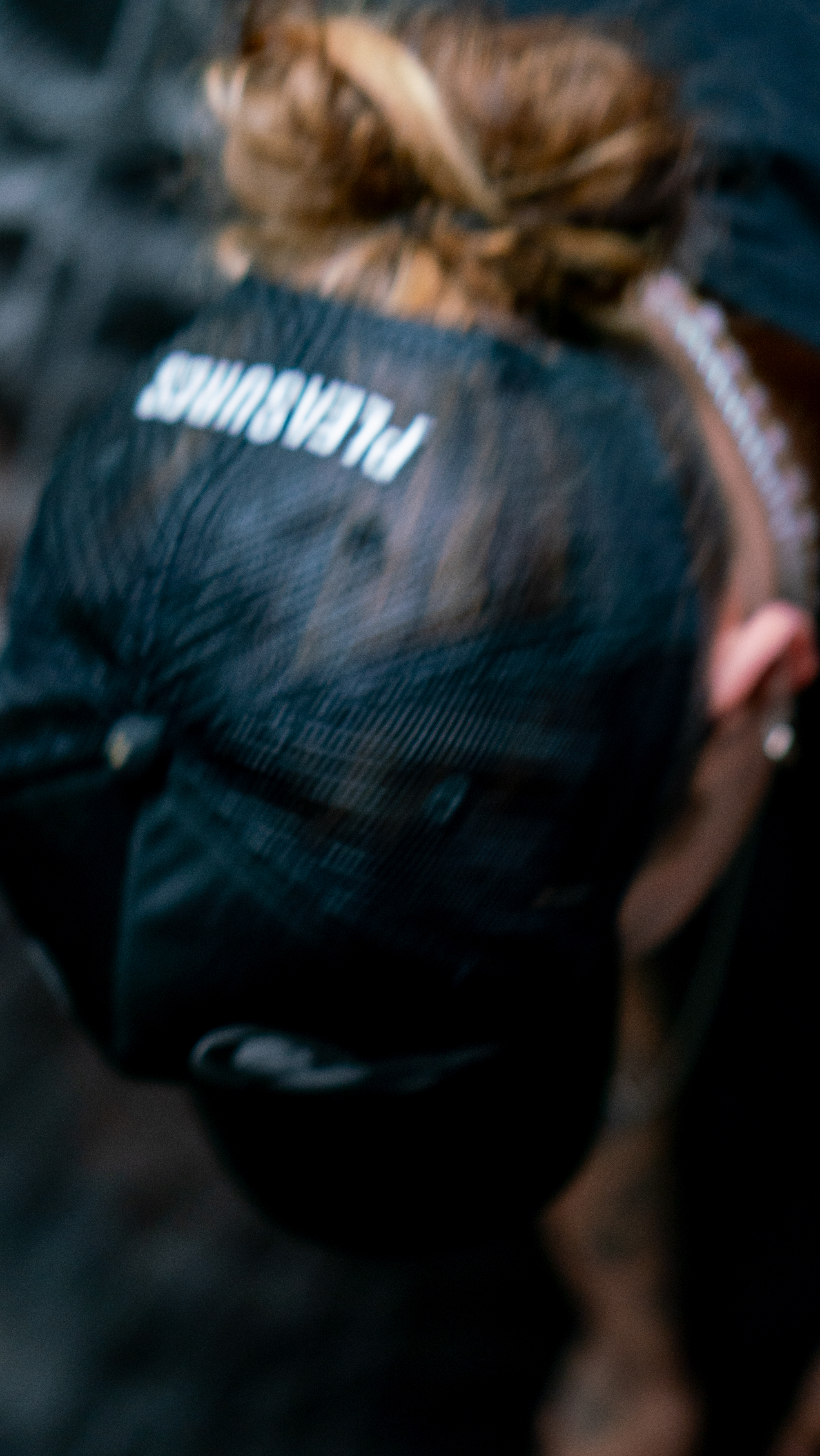Devincii — back of Pleasures jacket, artistic blur