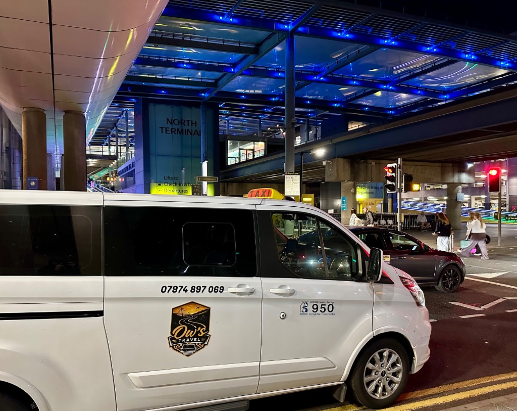 Ow's Travel minibus at Gatwick North Terminal
