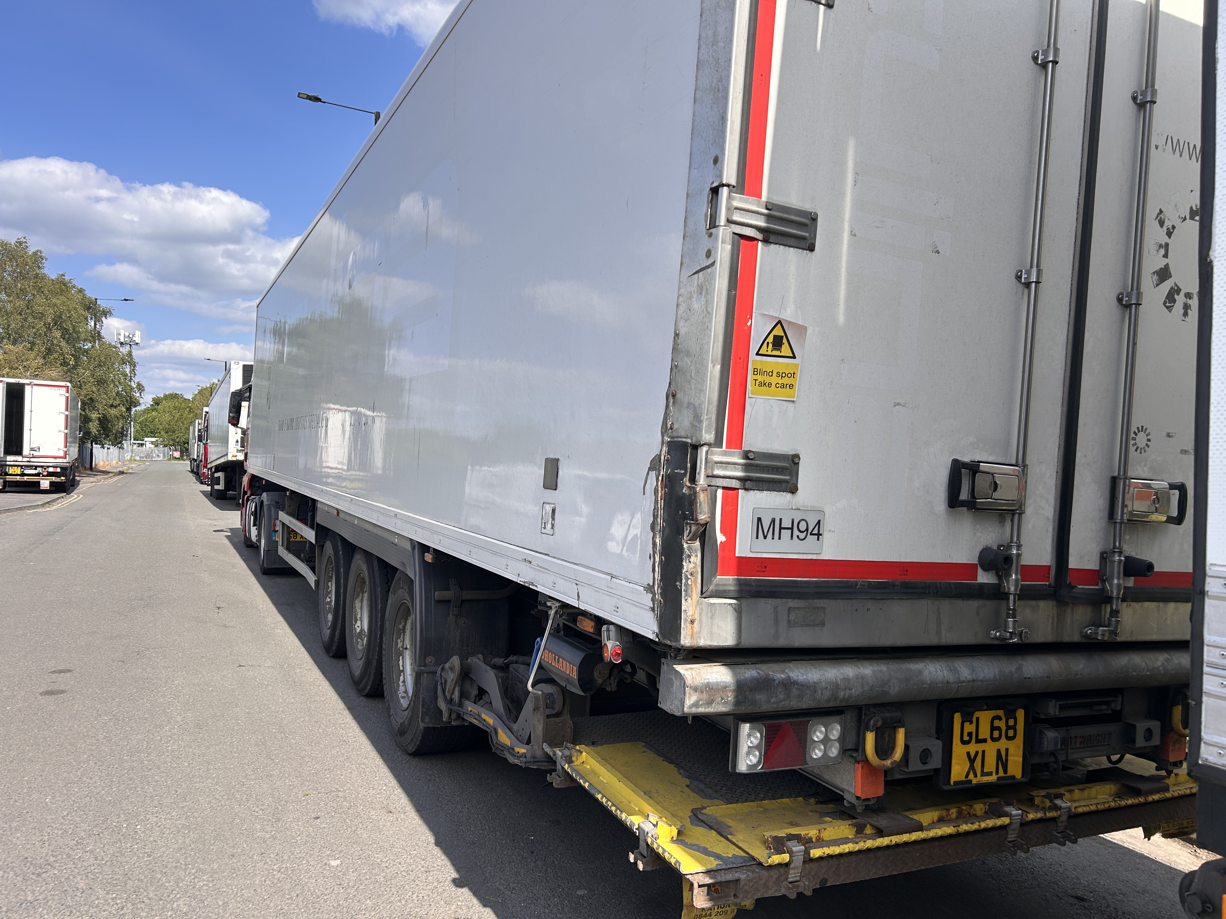Rear of MAN HGV with blind spot warning signage following DVS PSS installation
