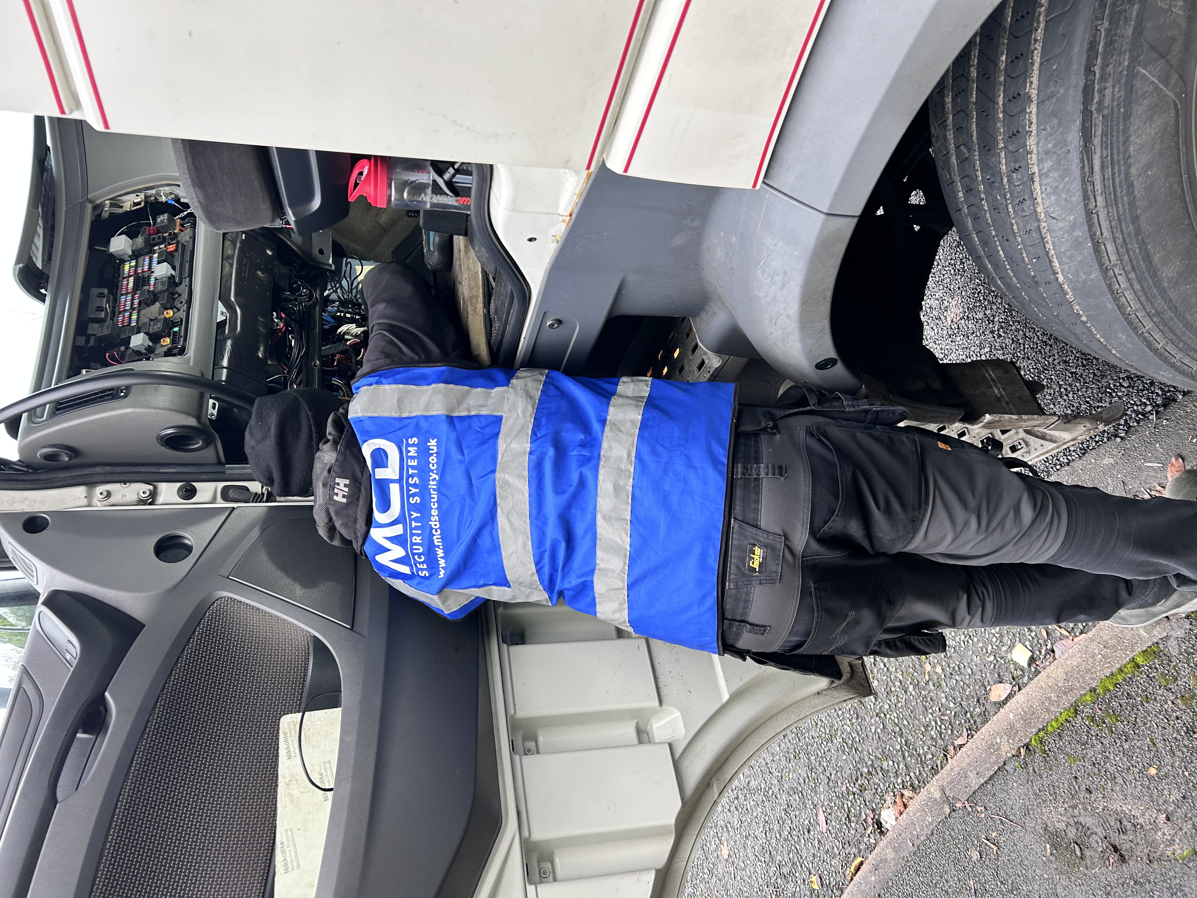 MCD Vehicle Systems engineer installing DVS PSS equipment on DAF HGV