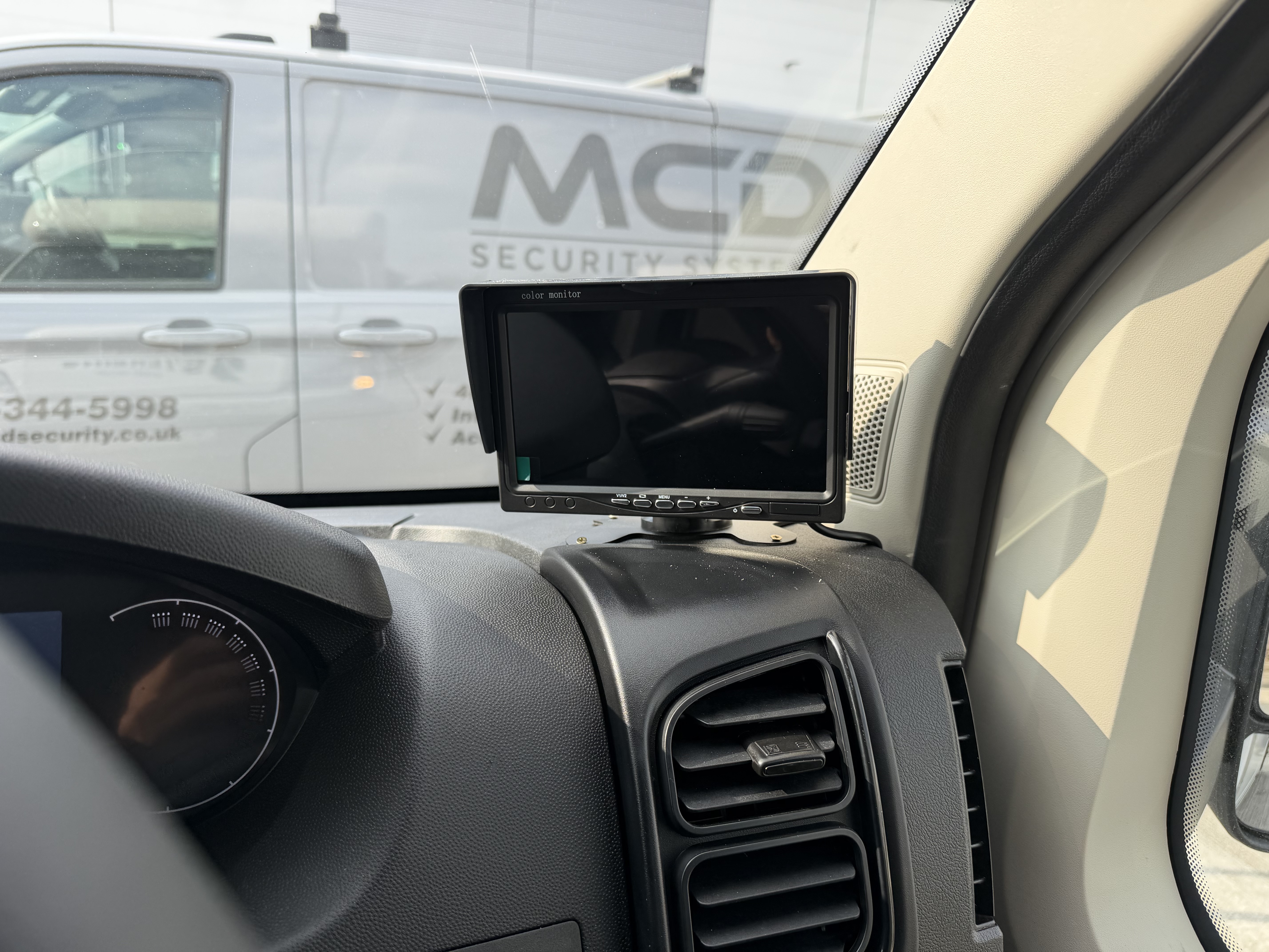 Luton van reversing camera monitor professionally installed in cab