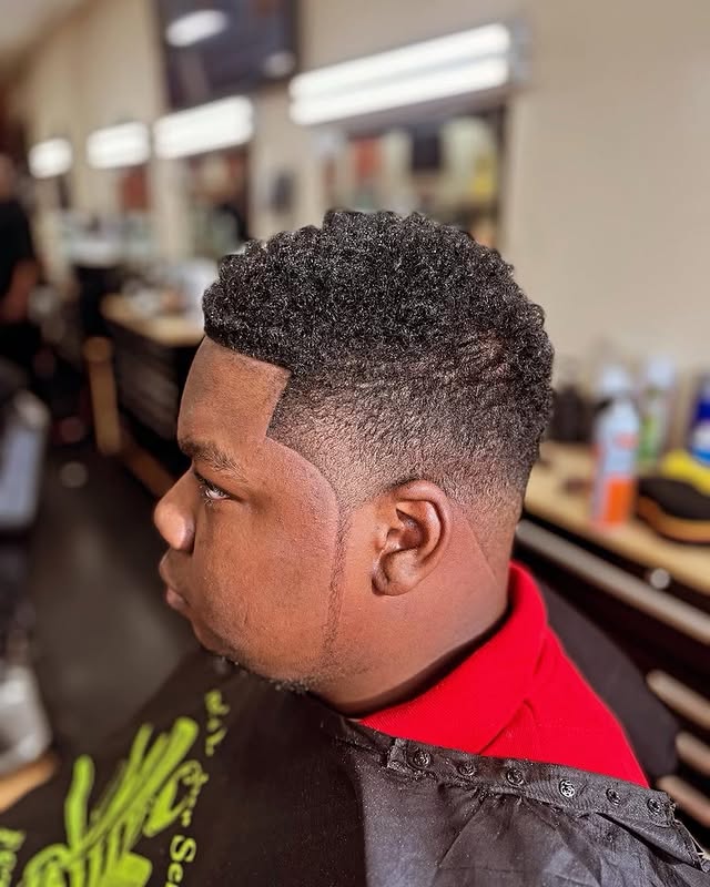 Taper fade with full beard lineup at Greene's Barber Service