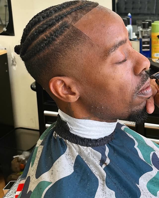Cornrow braids with skin fade at Greene's Barber Service