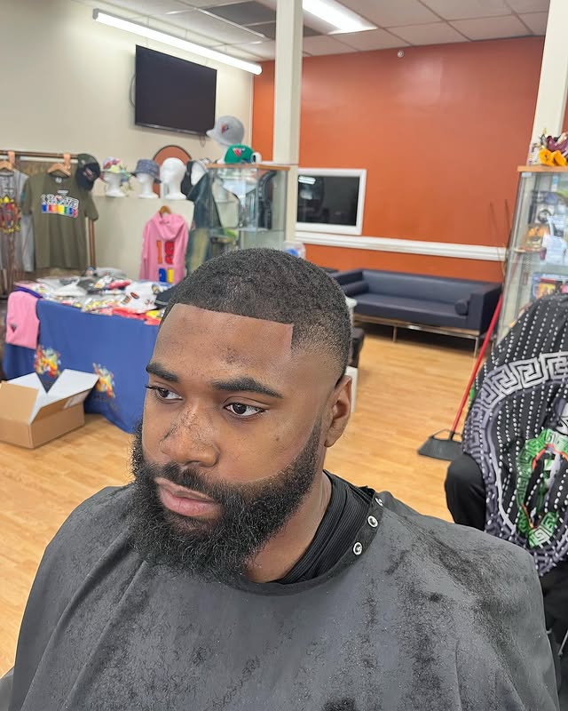 Flat top fade with sharp lineup at Greene's Barber Service