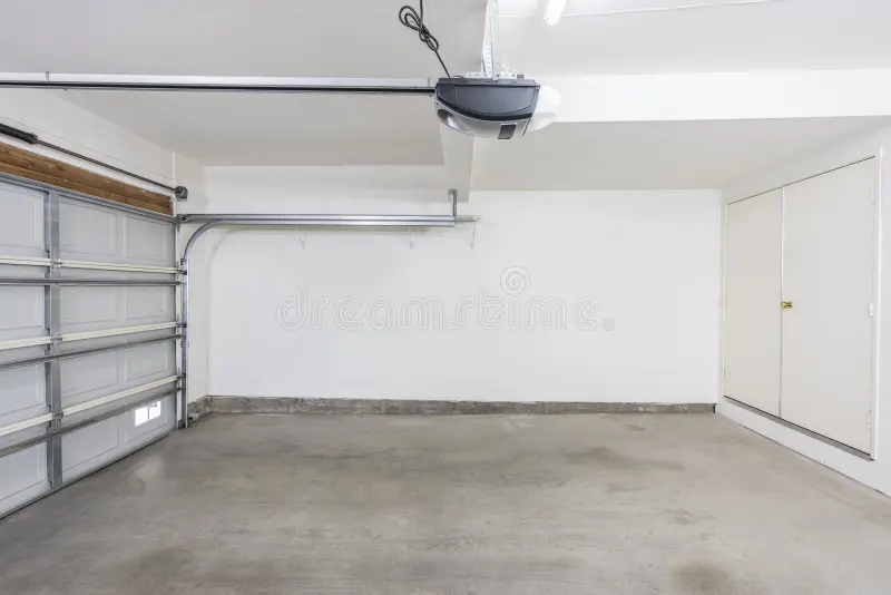 Empty clean two-car garage interior after cleanout