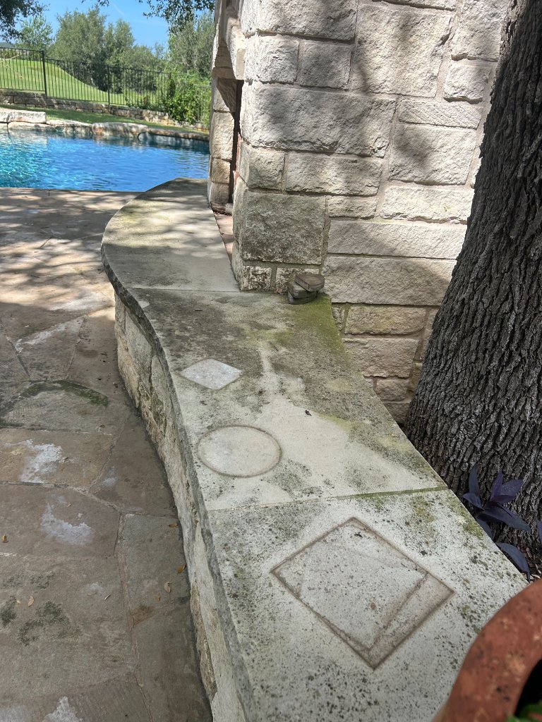 limestone retaining wall cleaning pressure washing Austin TX — Pressure's On Powerwashing — before