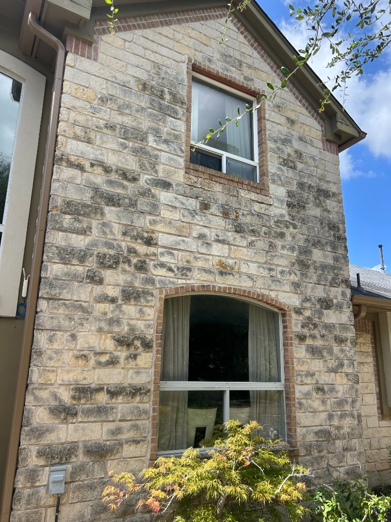 limestone house exterior soft washing pressure washing Austin TX — Pressure's On Powerwashing — before