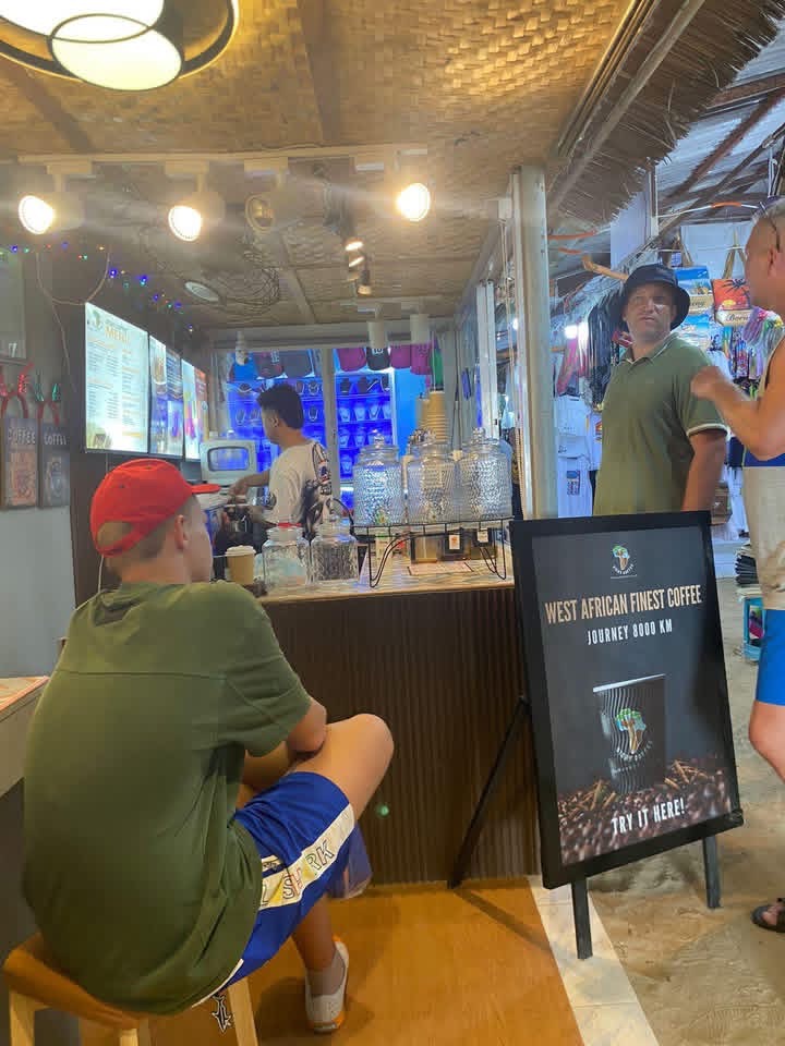 Sisay Coffee counter with A-frame sign in Boracay