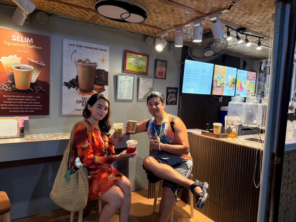 Customers enjoying coffee at the Sisay Coffee counter in Boracay