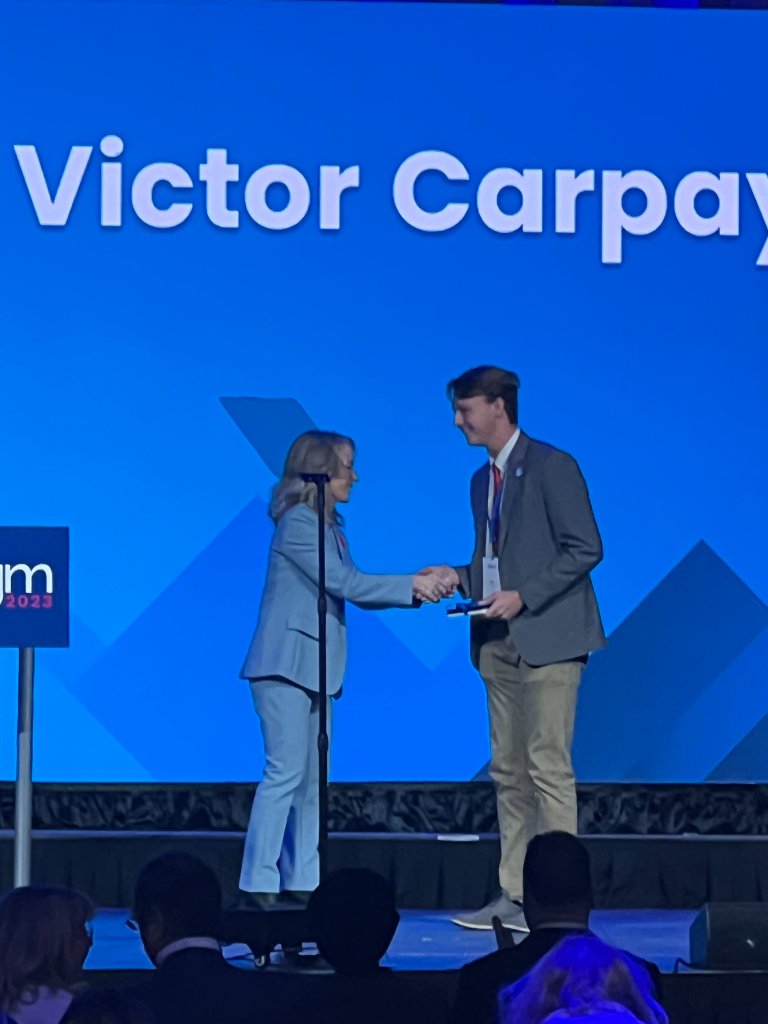 Receiving recognition at the UCP AGM, 2023