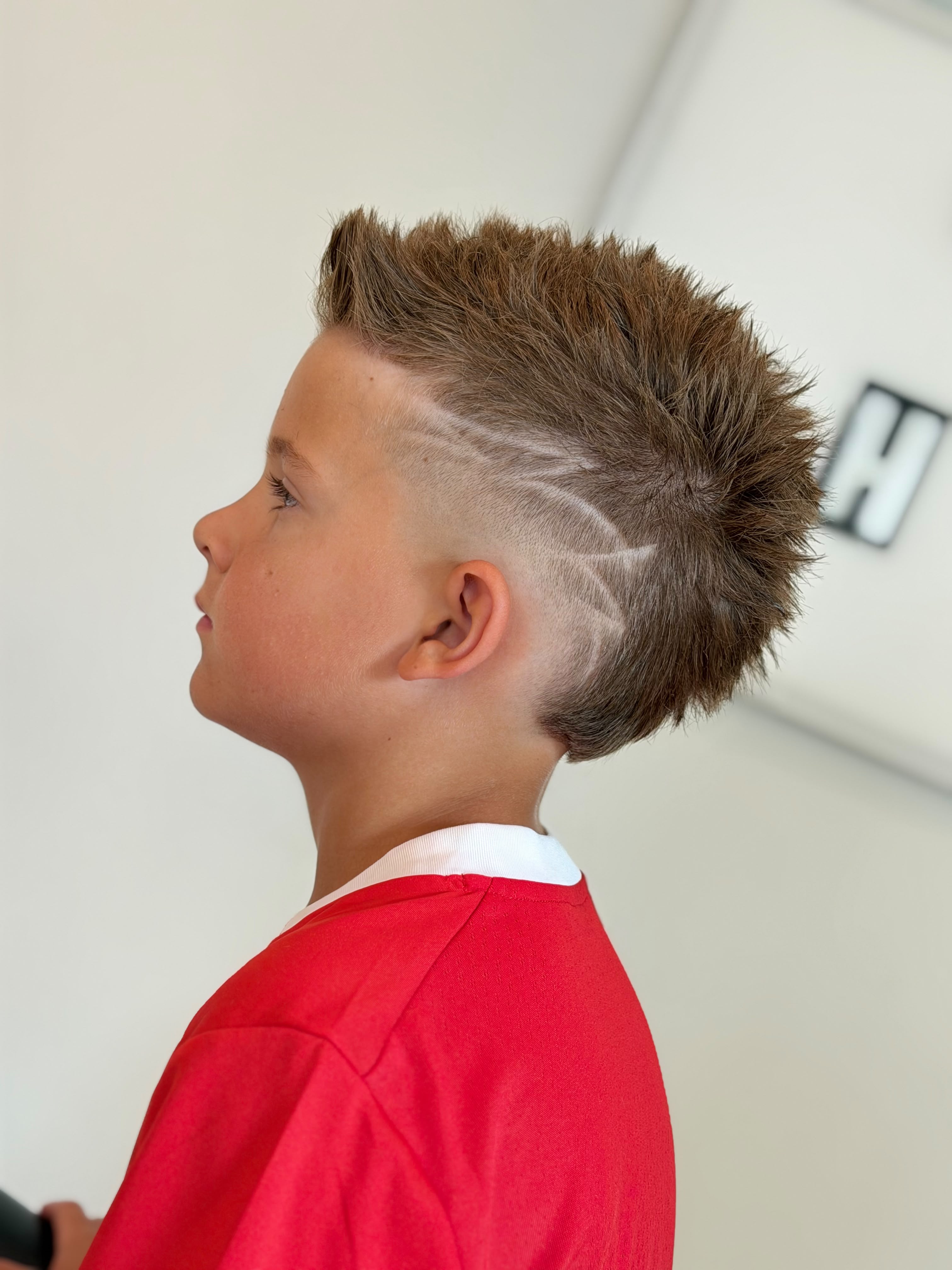 Junior Star Fade hairstyle result - Faux-Hawk / Star Design