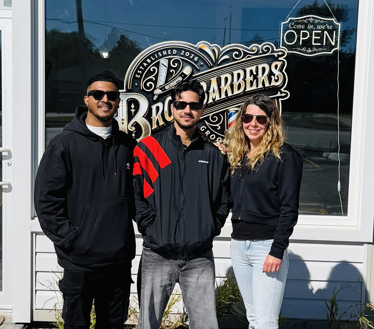 Environmental portrait of ASHLEY, master barber at Bros Barber