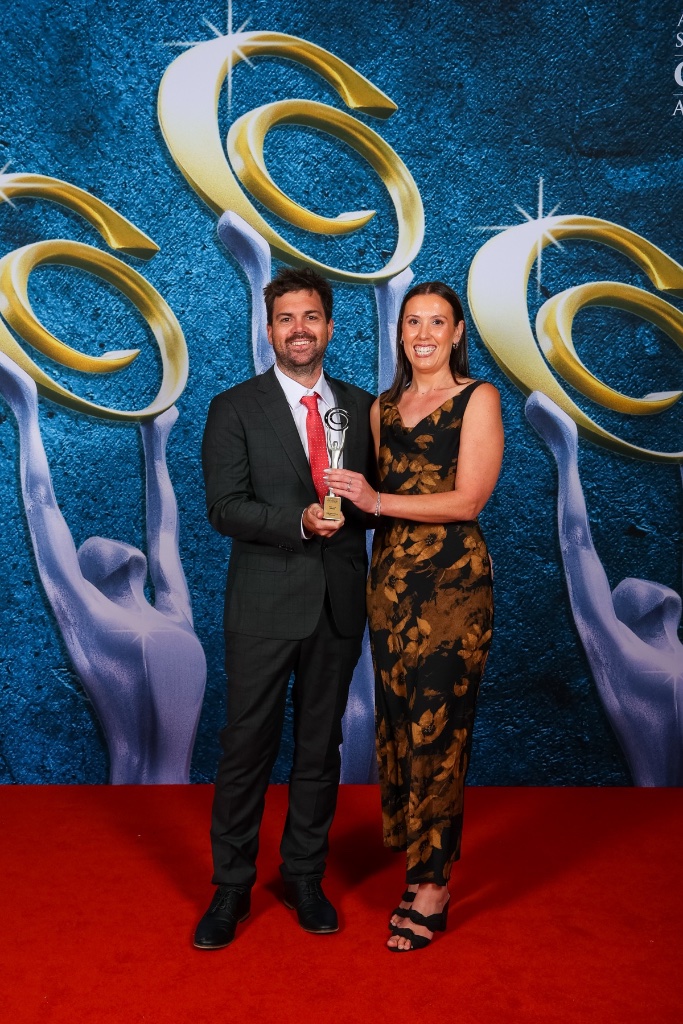 Casey and Katie holding the 2025 Australian Trades Champion Builder award