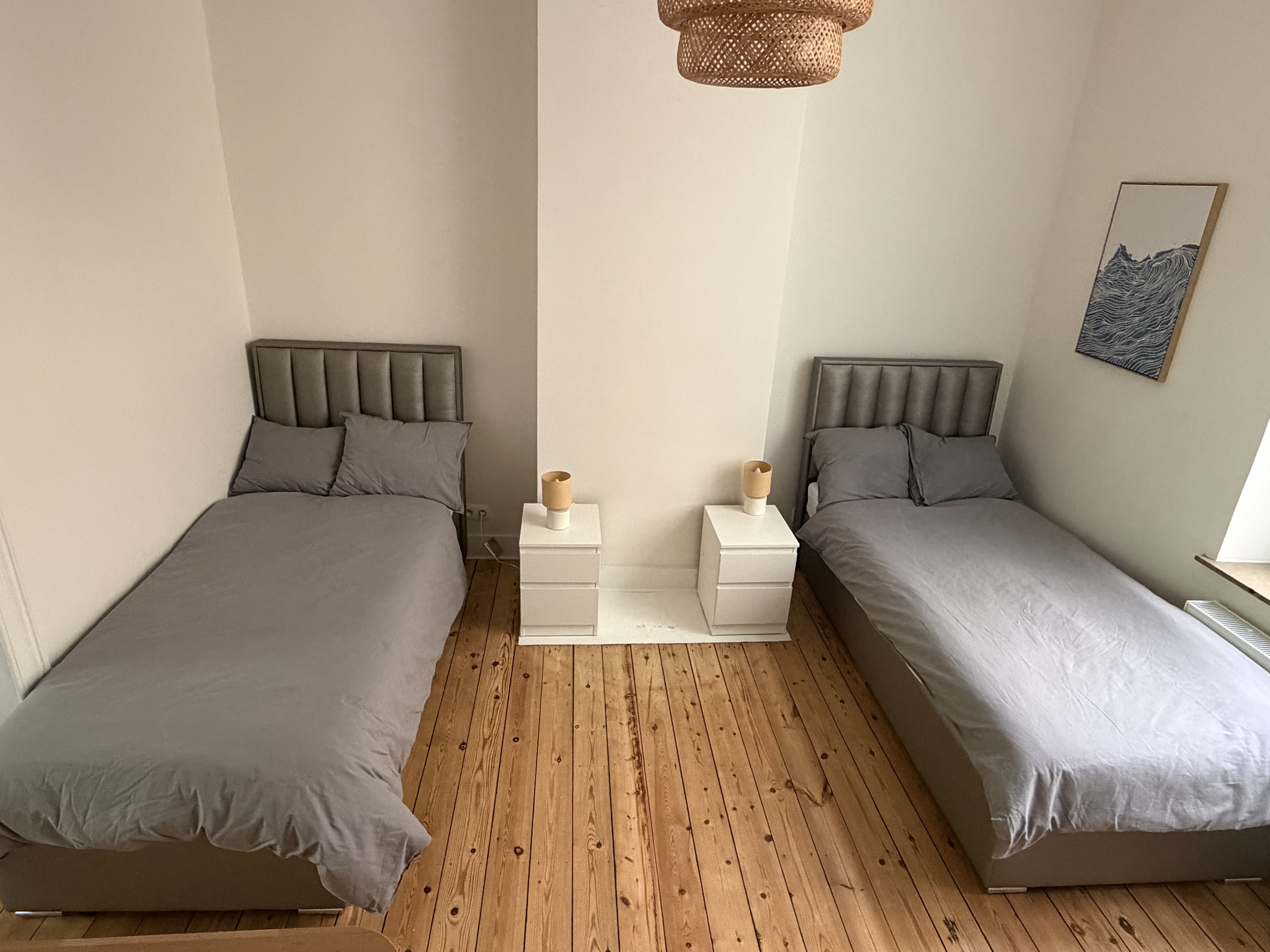 Chambre avec deux lits simples