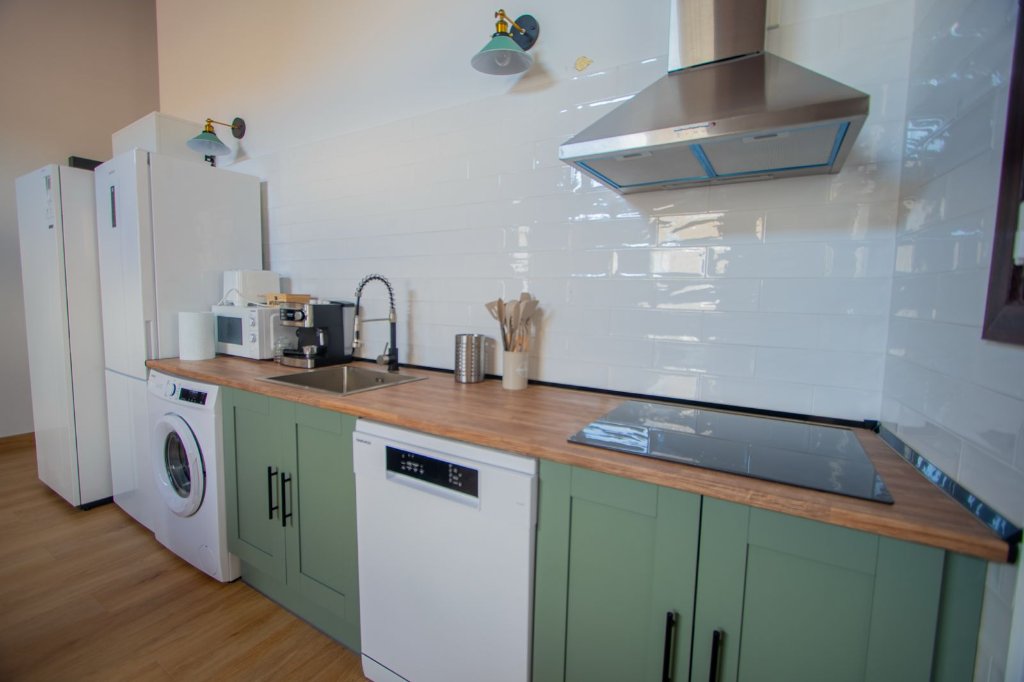 Cocina verde equipada