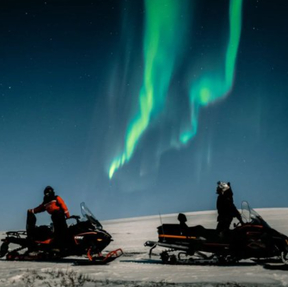 Northern Lights snowmobile safari in Alta