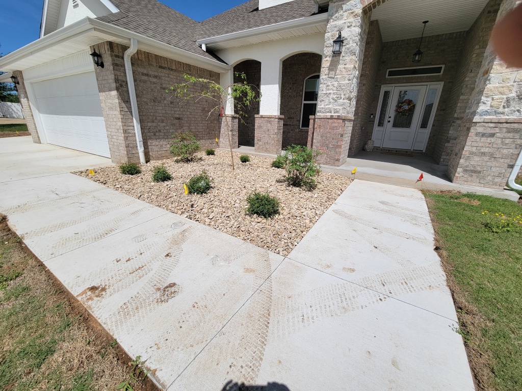 Wide view of formal boxwood hedge garden at estate home