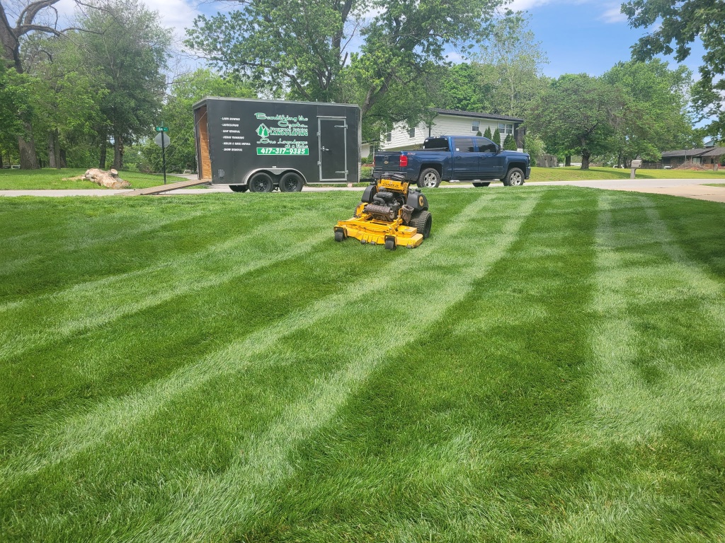 Diamond checkerboard mowing pattern on large lawn