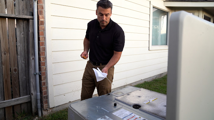 Oil level check during scheduled service — Never Dark Carolinas