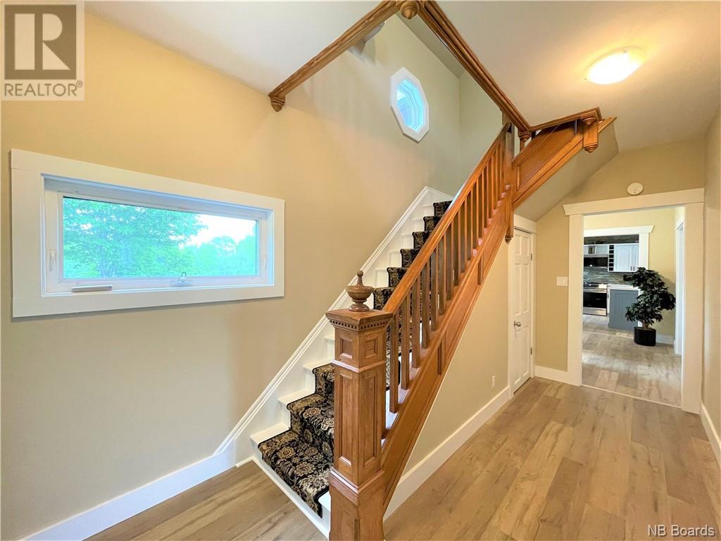 Main staircase with painted walls