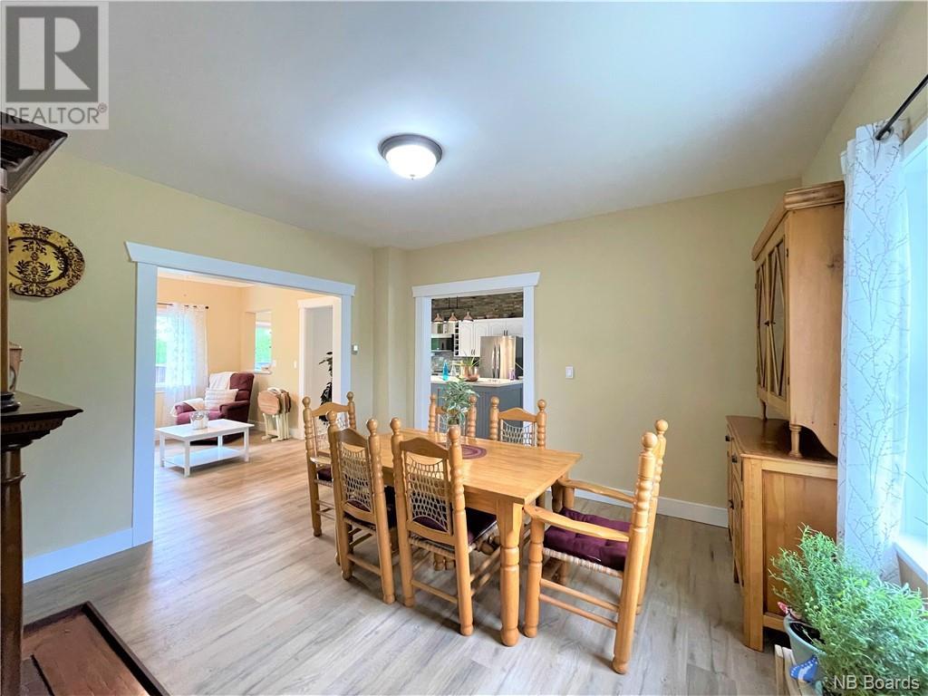 Dining room with freshly painted walls and fireplace