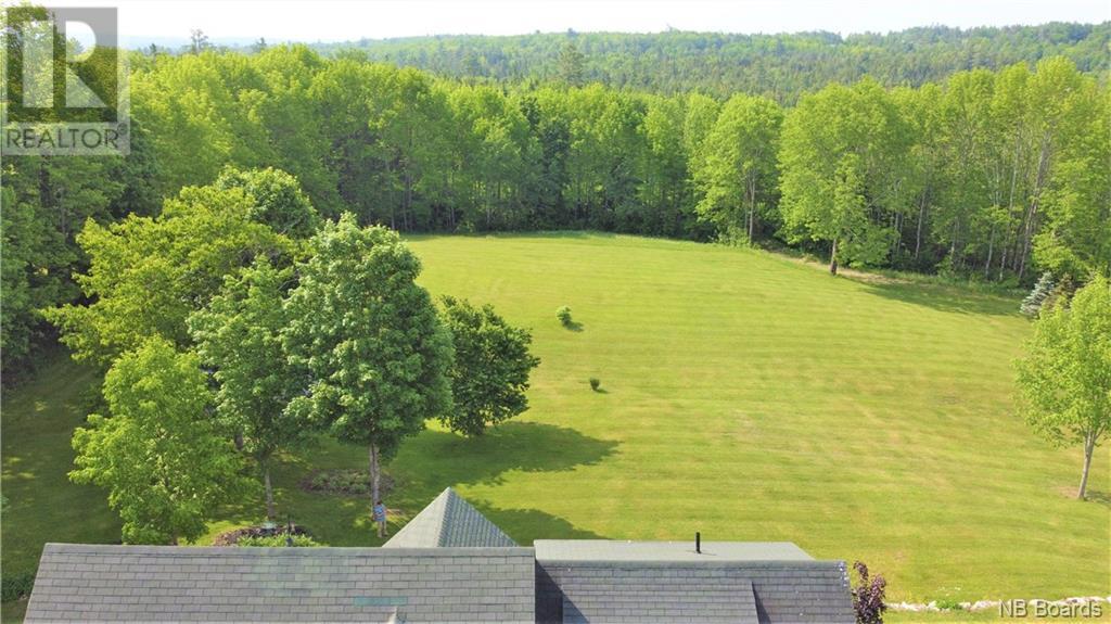 Wide aerial shot of property and countryside