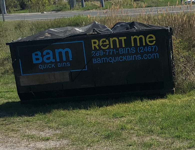 Black BAM container bin with branding