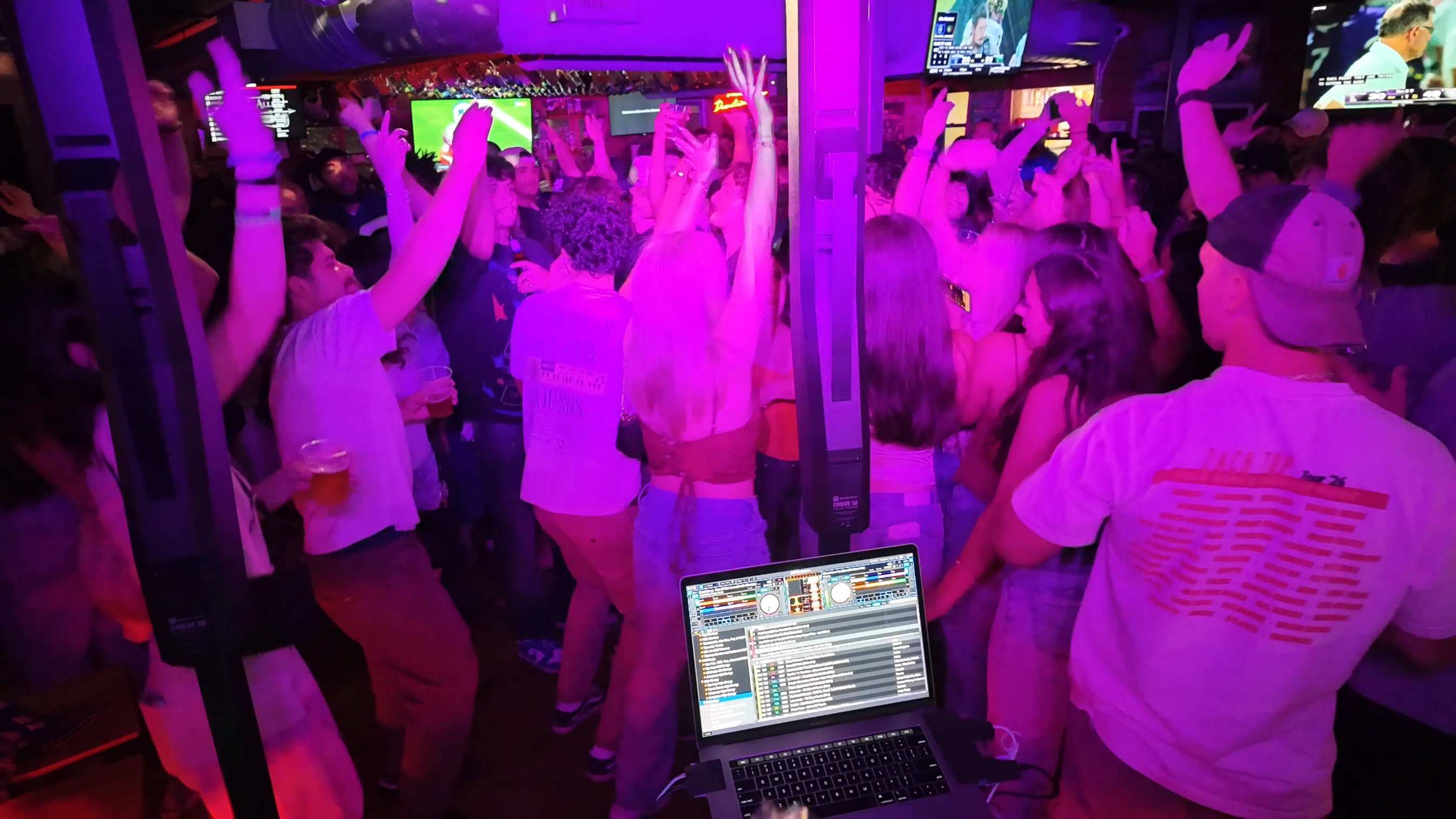 DJ BobbleHead's booth overlooking a packed South Coast Massachusetts nightclub dance floor