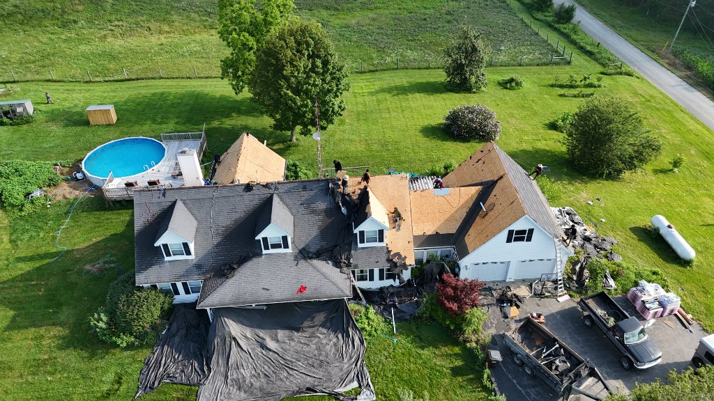 Tear-Off In Progress — Multi-Gable Roof