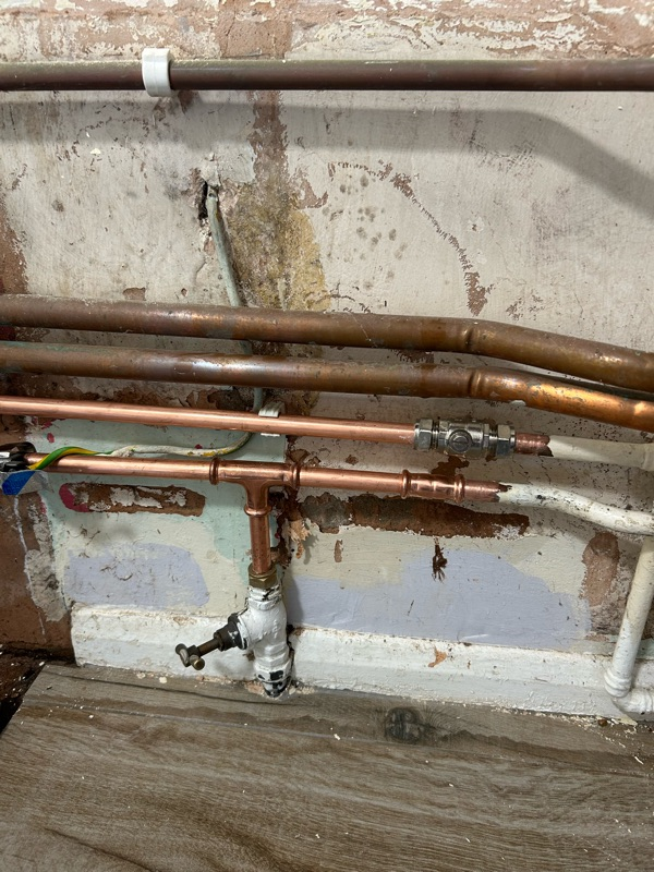 Water Leak — After — Plumbing project by Curtis and Carder