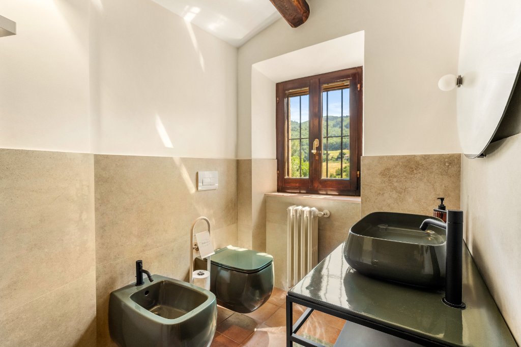 Window framing Umbrian countryside view