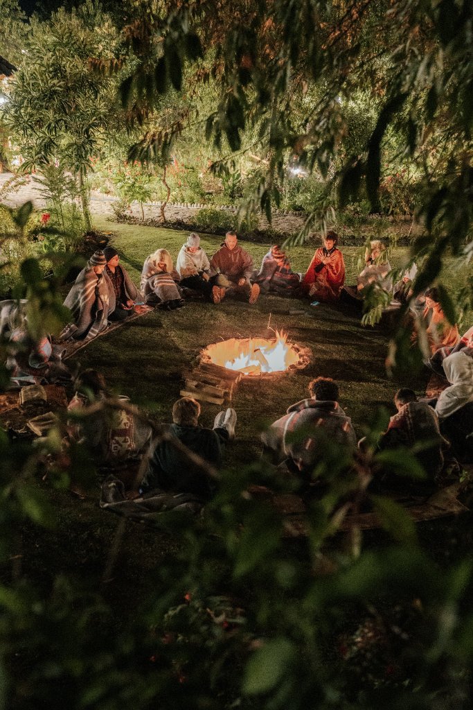 Andean fire ceremony circle under the night sky