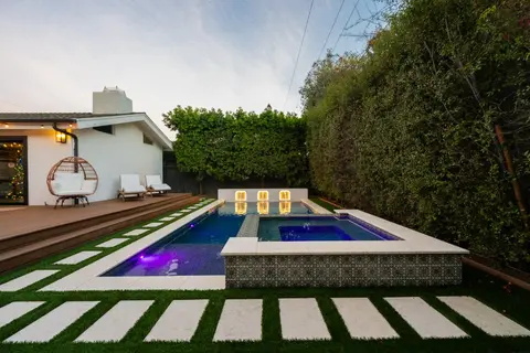 LED-lit pool and landscape at a Costa Mesa home