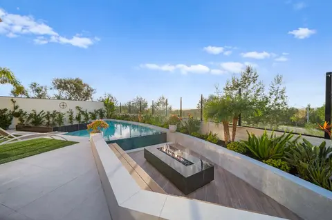 Custom pool and deck designed for entertaining in Irvine, CA