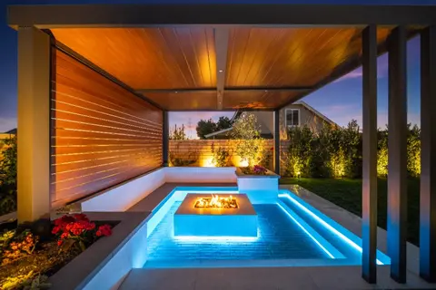 Custom estate pool with fire features in Huntington Beach, CA