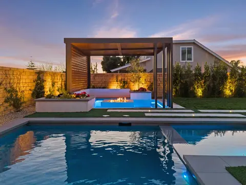 Fire bowls and LED lighting at a custom Huntington Beach estate pool