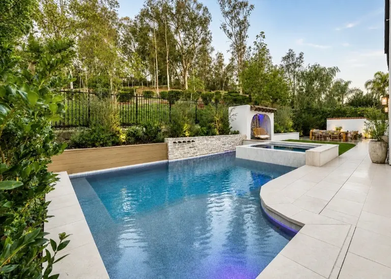 Custom pool and spa with modern geometric design at a Tustin residence