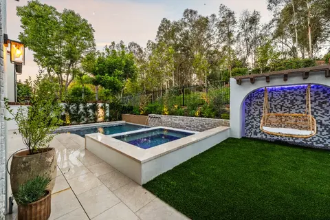 Modern backyard transformation with custom pool and spa in Tustin, CA