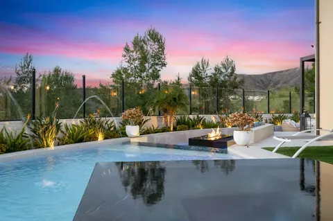 Custom gunite pool detail with glass tile accents in Irvine, California