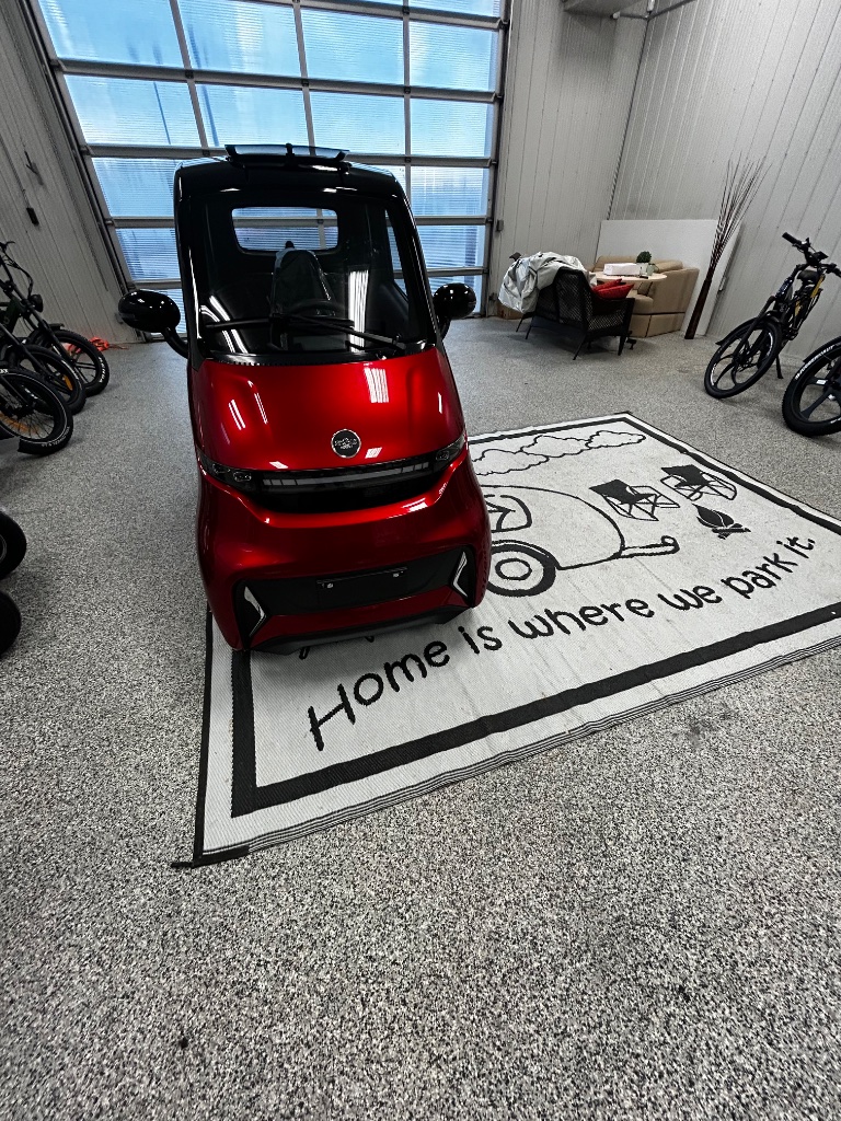 Red ET-4 Cruise Spark fully enclosed mobility scooter at True North Mobility showroom