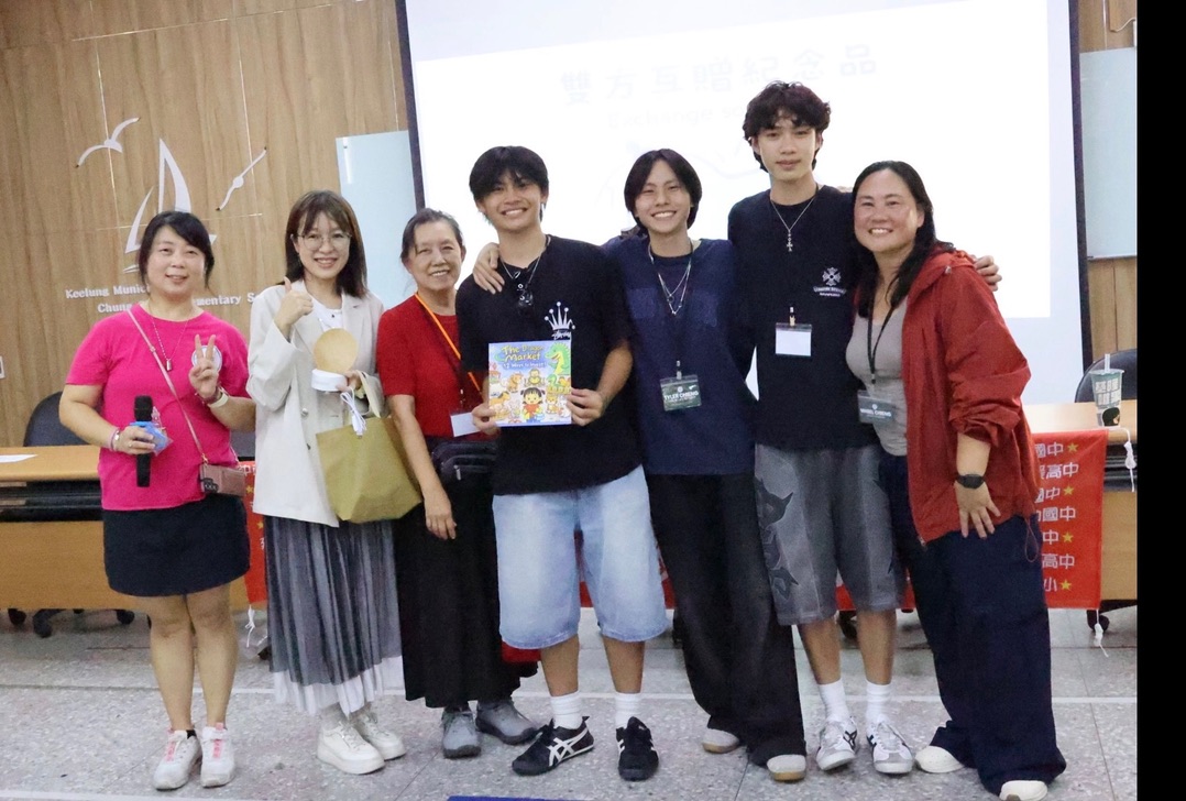 Dollar Sense team donating The Dragon Market in Taiwan