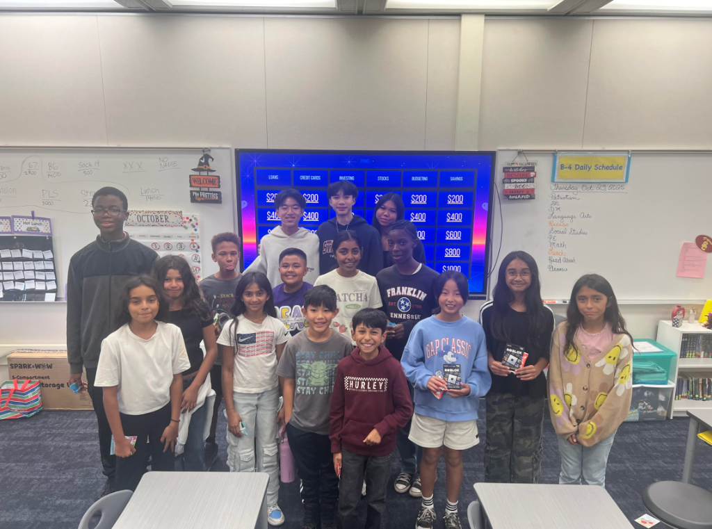 Students participating in a Dollar Sense finance workshop