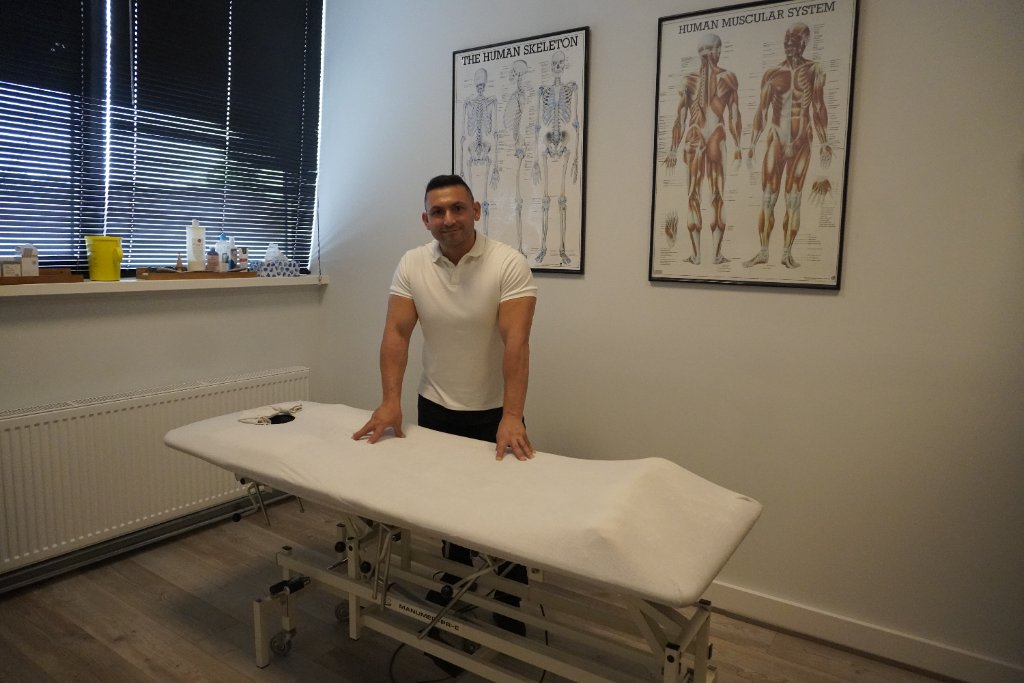 Sensportmassage owner in treatment room