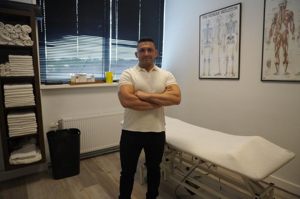Sports massage therapist — professional and focused