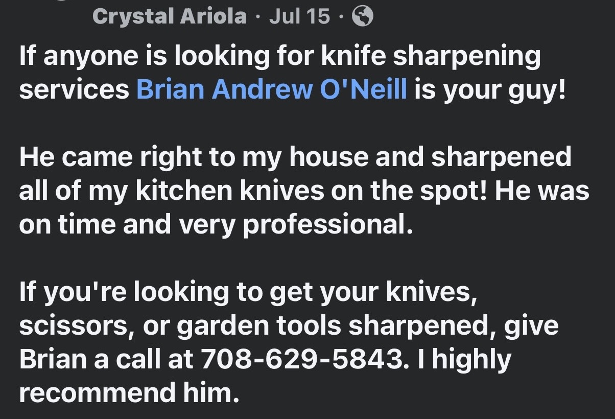 Brian and a smiling customer with freshly sharpened knives