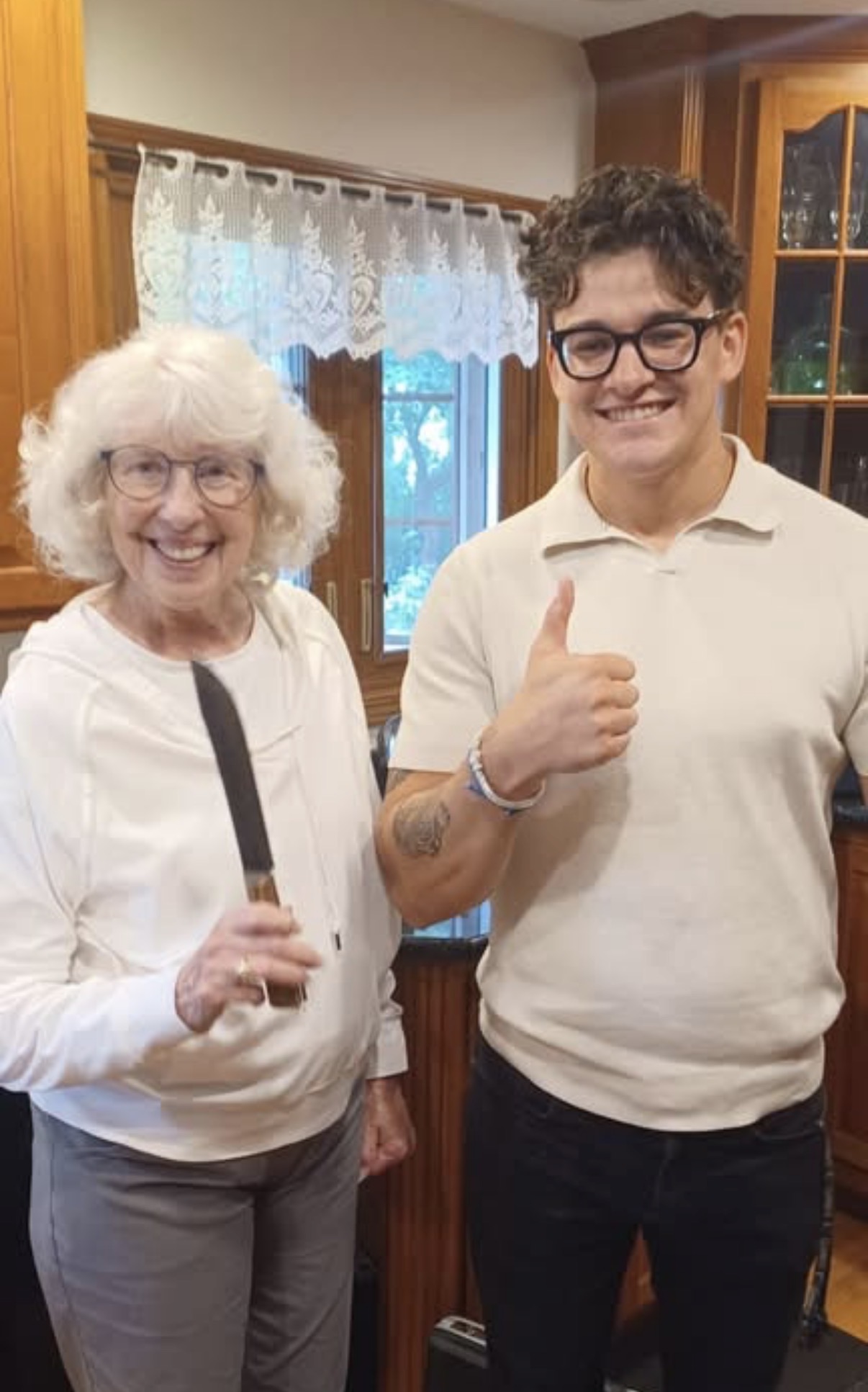 Brian with a happy customer after sharpening her knives