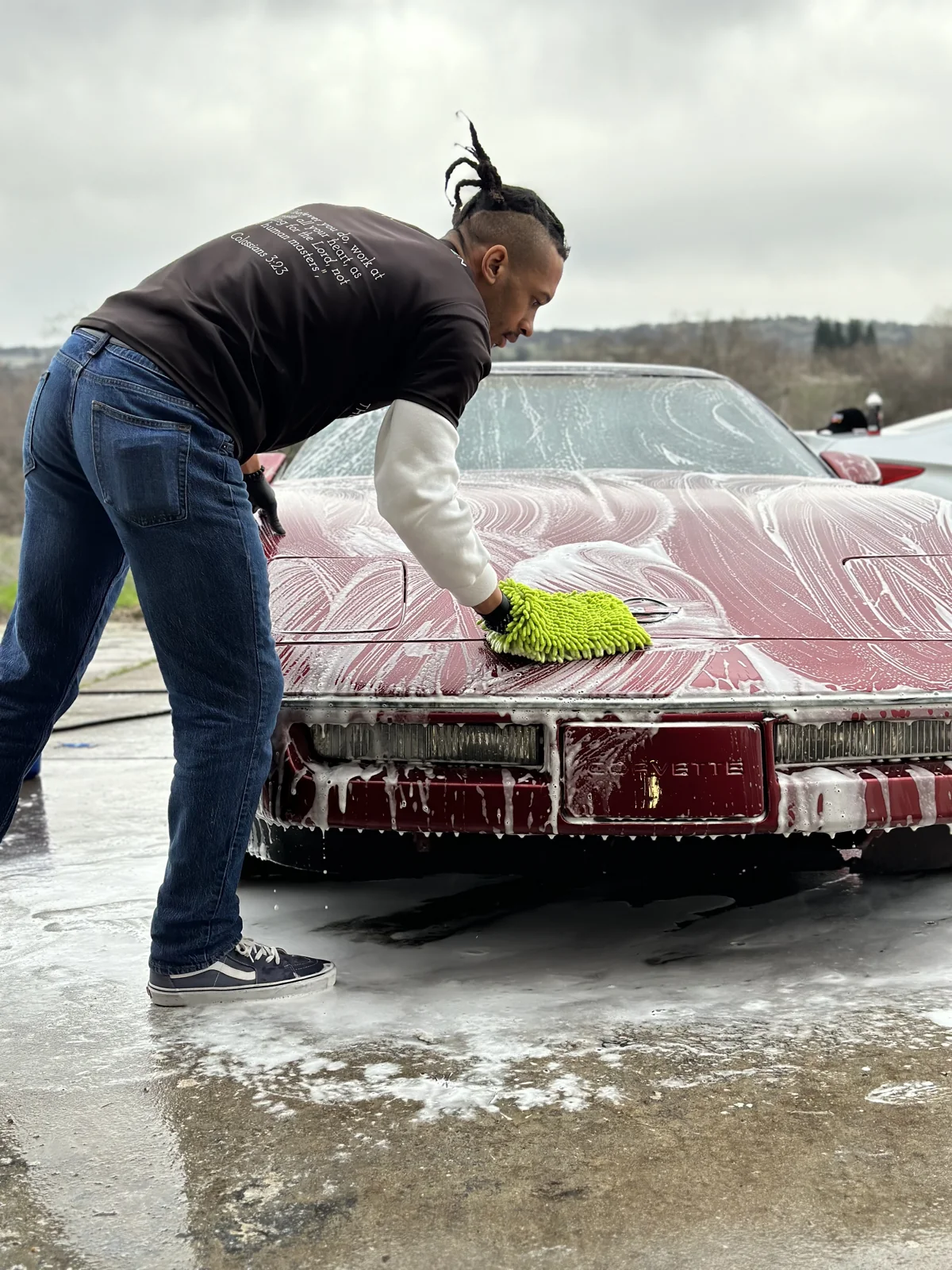 A vehicle hand washed by TheWashMen at a driveway