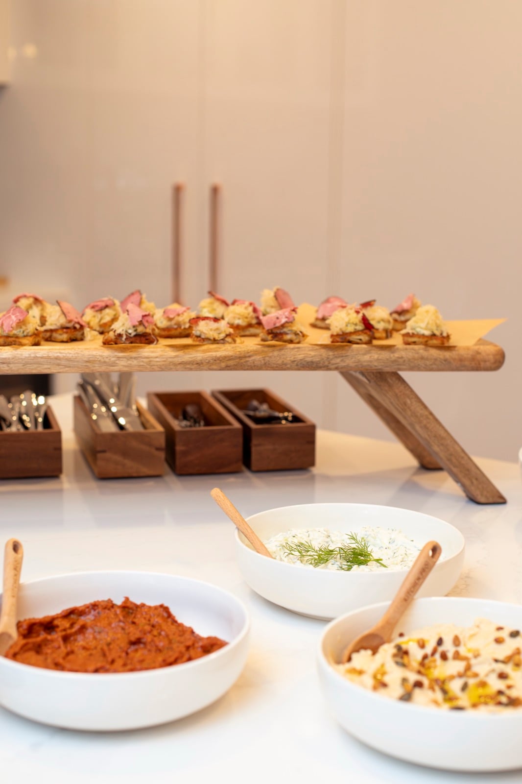 Guests gathering around a thoughtfully prepared private dining spread