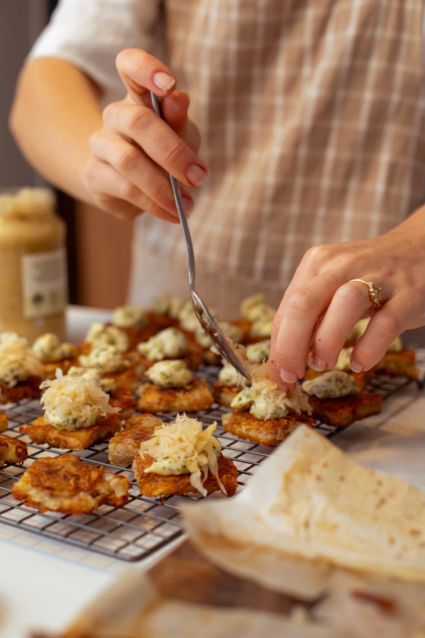 Victoria finishing handmade canapés for her guests